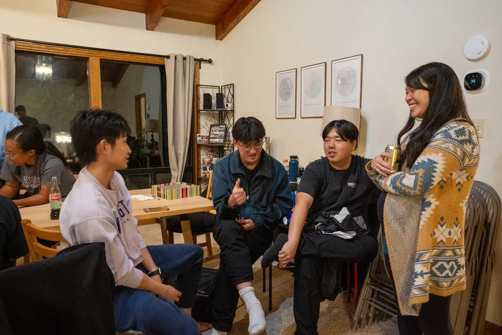 Klesis students laughing together at Friendsgiving