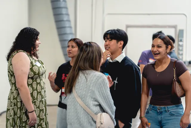 Students mingling and laughing together