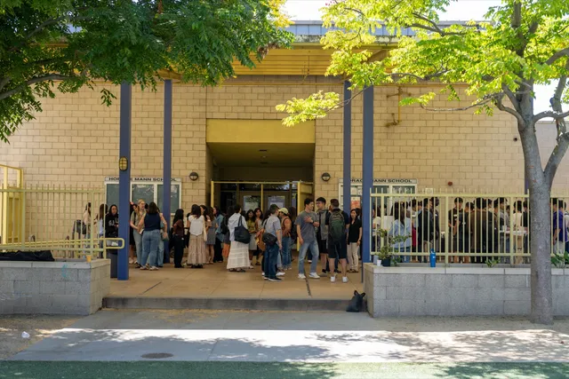 Students gathering outside the entrance to Horace Mann Elementary School