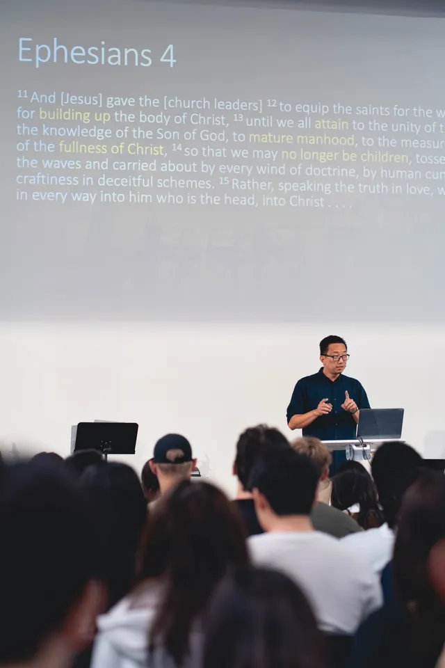 Pastor teaching from Ephesians 4 during Sunday service