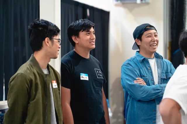 Friends laughing together between services