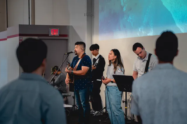 Worship band leading the congregation in song